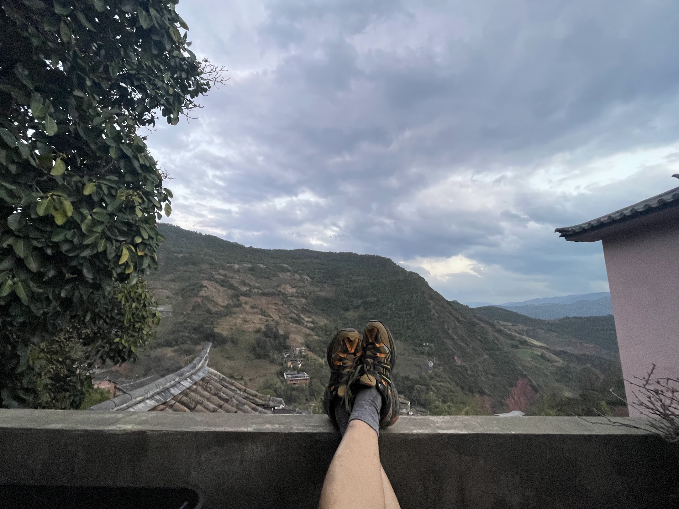An Afternoon in the Village — watching clouds gather over the mountains